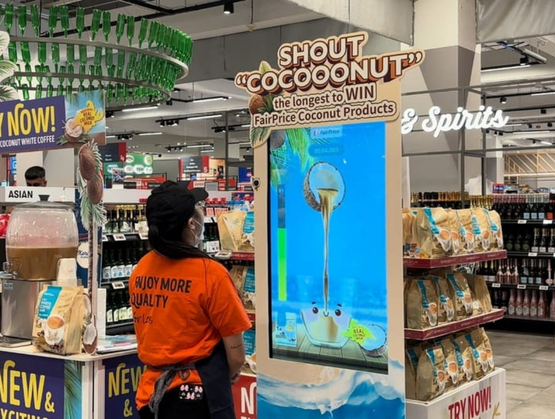 Shoppers participating in the FairPrice Coconut White Coffee Scream Challenge powered by qiksense at FairPrice Xtra.