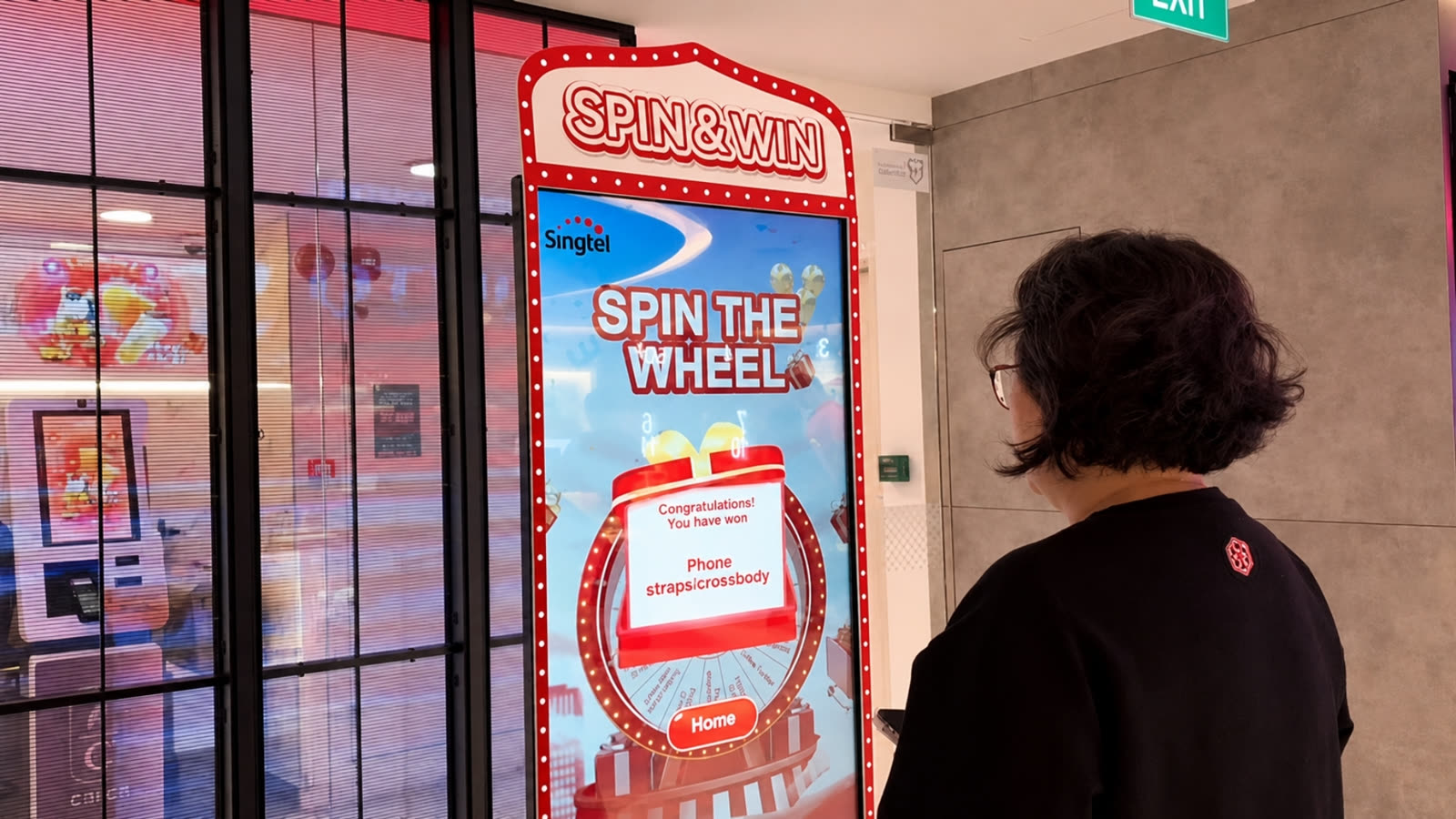 Singtel scaled Spin the Wheel campaign from events to retail with qiksense — image 3.