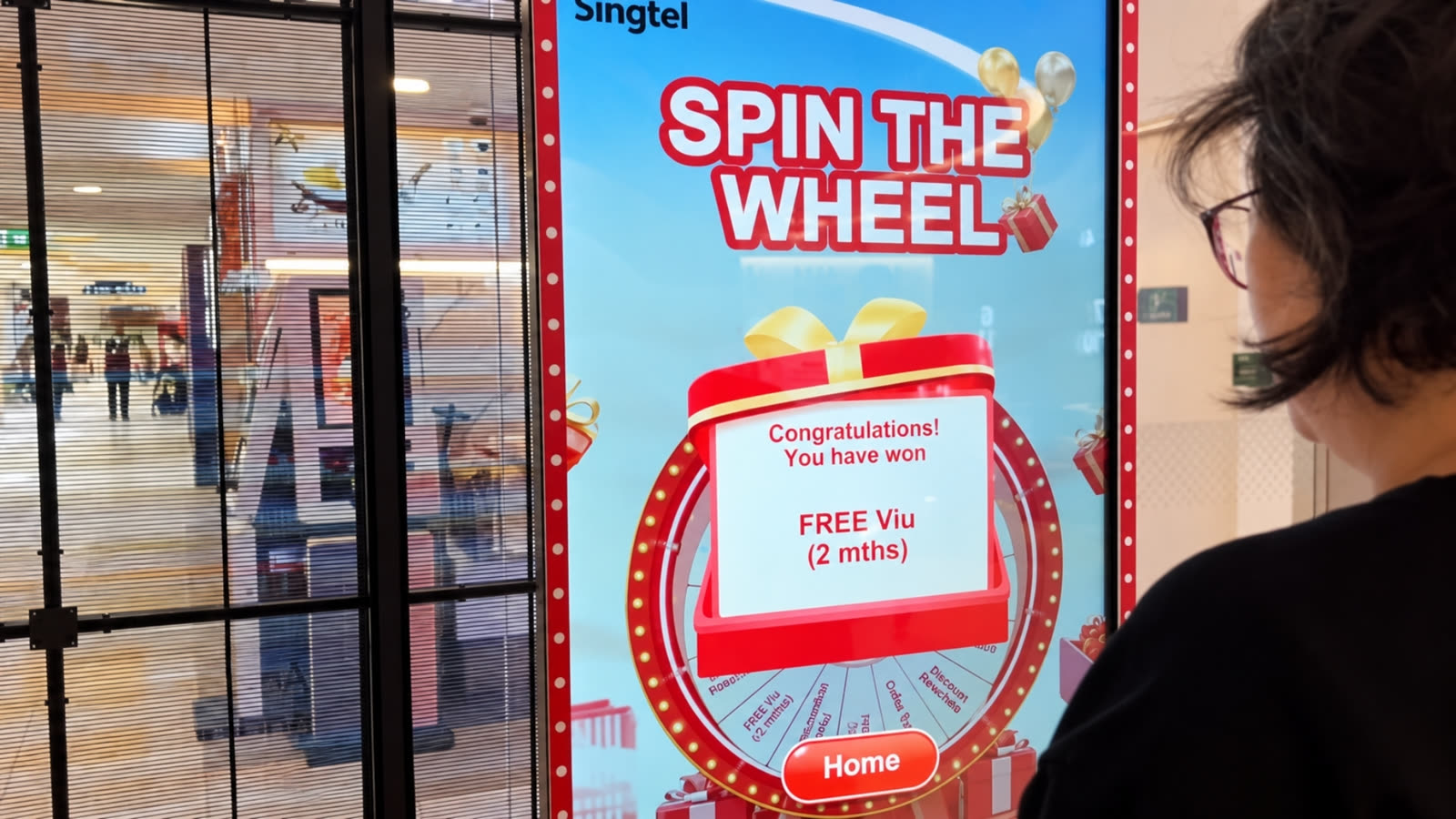 Singtel scaled Spin the Wheel campaign from events to retail with qiksense — image 4.