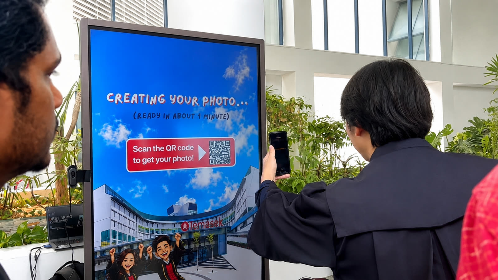Graduates using Temasek Polytechnic AI caricature photobooth by qiksense — image 4