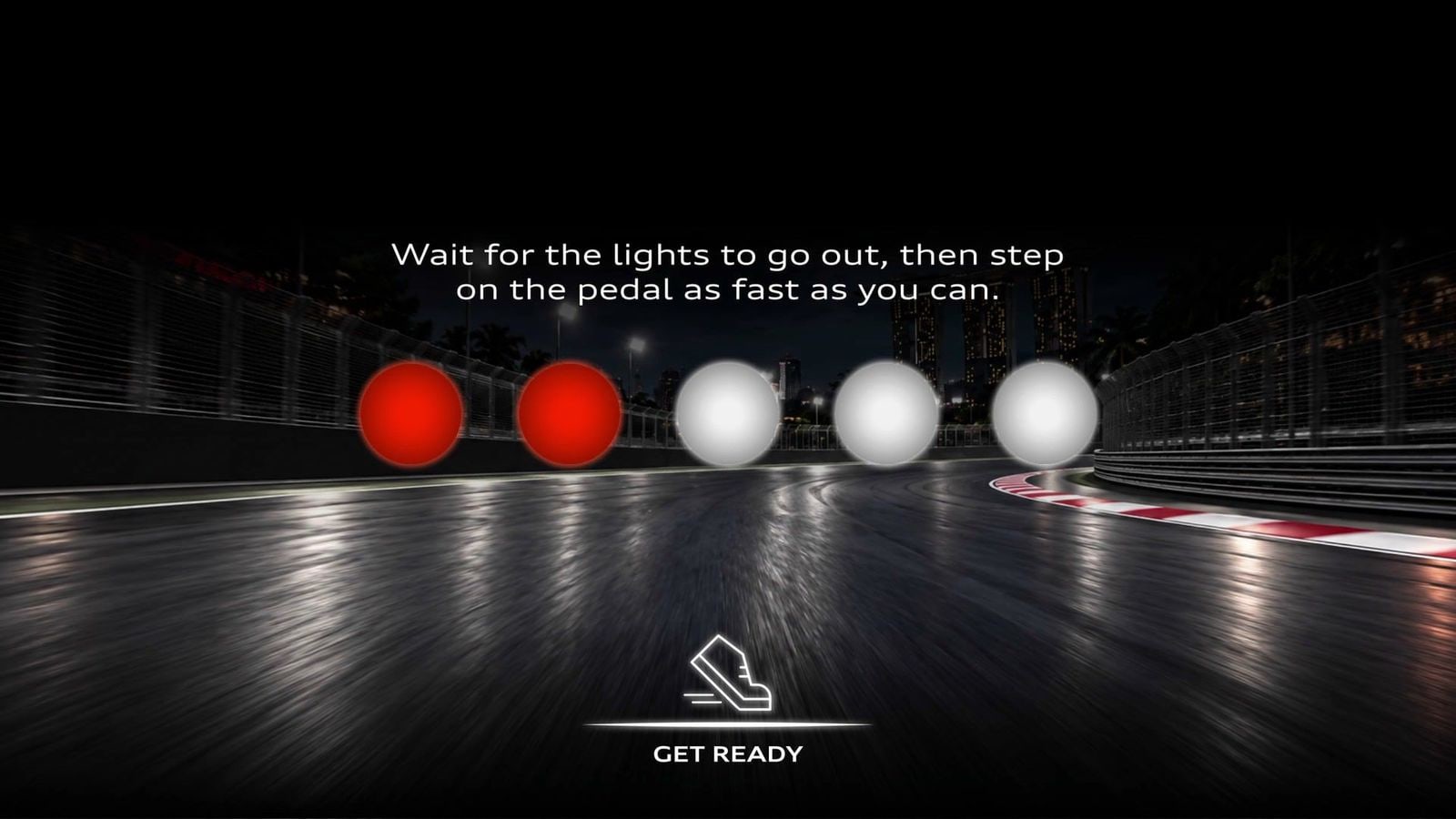 The Lights Out Challenge game screen built on qiksense, with the five start lights coming on one by one