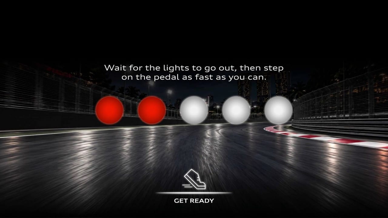 The game asking players to step on the pedal as fast as they can once the lights go out